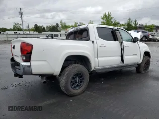 2020 Toyota Tacoma SR5 z VIN 3TMCZ5AN2LM339564, wystawiony jako Copart lot #57871255 z przebiegiem Nie podano mil oraz Szkoda całkowita • Salvage title. Historia ofert i sprzedaży dostępna na DreamBid. Obrazek 3.