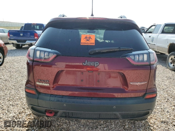 2020 Jeep Cherokee Trailhawk Elite z VIN 1C4PJMBN4LD549550, wystawiony jako Copart lot #64161064 z przebiegiem Nie podano mil oraz Szkoda całkowita • Salvage title. Historia ofert i sprzedaży dostępna na DreamBid. Obrazek 6.