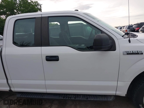 2019 Ford F-150 XL with VIN 1FTFX1E52KKD85150, listed as a IAAI auction lot 42124342 with 122,760 mi miles. Bid and sale history available at carsss.com. Image 13.