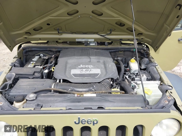 2013 Jeep Wrangler Sport z VIN 1C4AJWAG8DL535534, wystawiony jako IAAI lot #42454222 z przebiegiem 120 355 mil mil oraz . Historia ofert i sprzedaży dostępna na DreamBid. Obrazek 10.