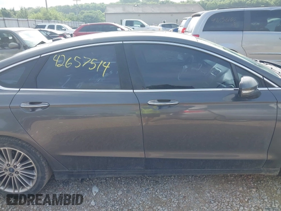 2016 Ford Fusion SE with VIN 3FA6P0T98GR155623, listed as a IAAI auction lot 42657514 with 171,518 mi miles and . Bid and sale history available at DreamBid. Image 14.