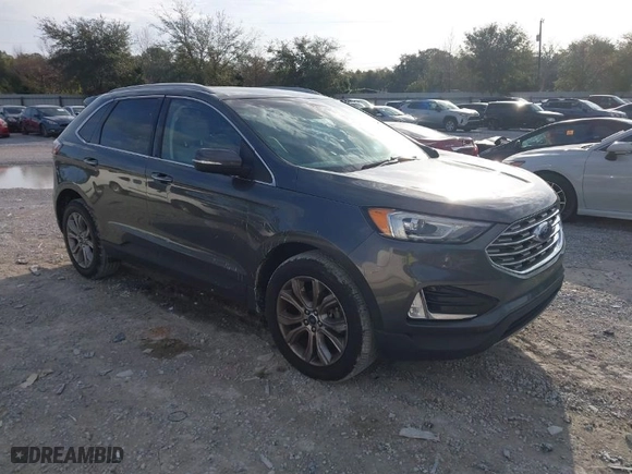 2019 Ford Edge Titanium with VIN 2FMPK3K92KBB37704, listed as a IAAI auction lot 41582488 with 132,036 mi miles. Bid and sale history available at carsss.com. Image 1.