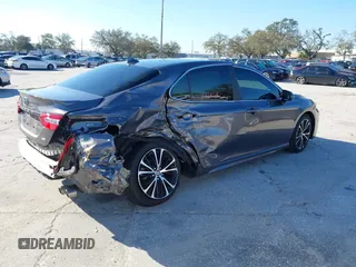 2020 Toyota Camry SE z VIN 4T1G11AK2LU392182, wystawiony jako IAAI lot #41667278 z przebiegiem 41 506 mil mil oraz . Historia ofert i sprzedaży dostępna na DreamBid. Obrazek 4.
