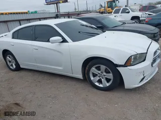 2013 Dodge Charger SXT Plus with VIN 2C3CDXHGXDH537220, listed as a IAAI auction lot 41905479 with 140,075 mi miles. Bid and sale history available at carsss.com. Image 13.