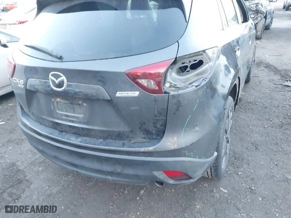 2016 Mazda CX-5 Grand Touring with VIN JM3KE4DY3G0817899, listed as a IAAI auction lot 41287459 with NaN miles. Bid and sale history available at carsss.com. Image 18.
