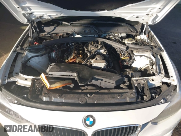 2013 BMW 3 Series 328i xDrive with VIN WBA3B5C56DF596114, listed as a IAAI auction lot 41313136 with 98,847 mi miles. Bid and sale history available at carsss.com. Image 10.