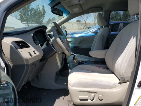 2014 Toyota Sienna LE AAS with VIN 5TDKK3DC8ES442280, listed as a Copart auction lot 59374985 with 207,563 mi miles and Salvage title. Bid and sale history available at DreamBid. Image 7.
