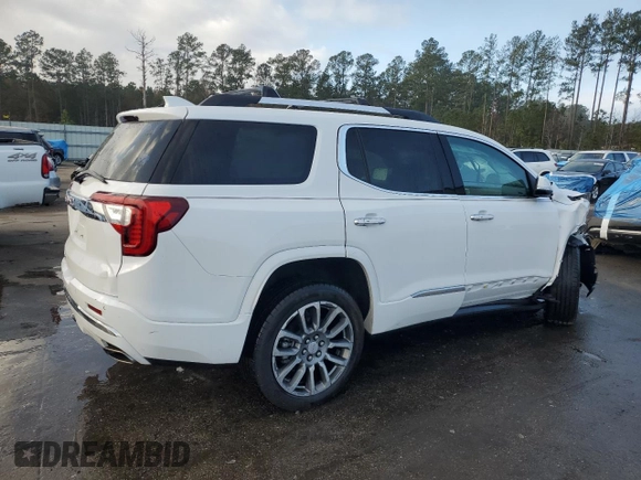 2023 GMC Acadia Denali with VIN 1GKKNPLS1PZ247635, listed as a Copart auction lot 84953044 with 12,869 mi miles and Salvage title. Bid and sale history available at DreamBid. Image 3.