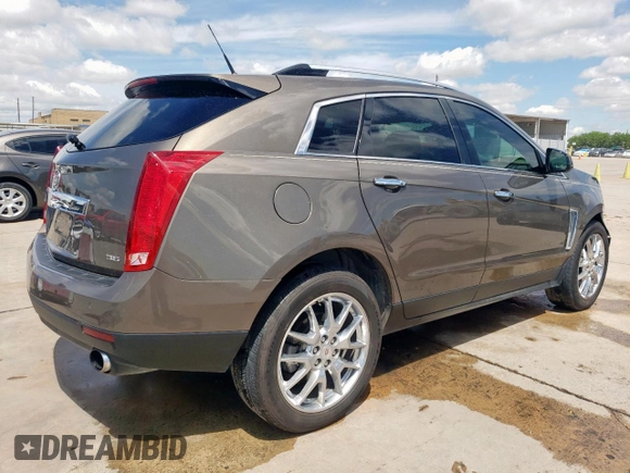 2014 Cadillac SRX Premium Collection with VIN 3GYFNDE33ES567108, listed as a Copart auction lot 55970265 with 97,720 mi miles and Salvage title. Bid and sale history available at DreamBid. Image 3.