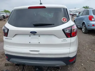 2017 Ford Escape SE with VIN 1FMCU0GD7HUC76041, listed as a IAAI auction lot 42187884 with 176,566 mi miles and . Bid and sale history available at DreamBid. Image 17.