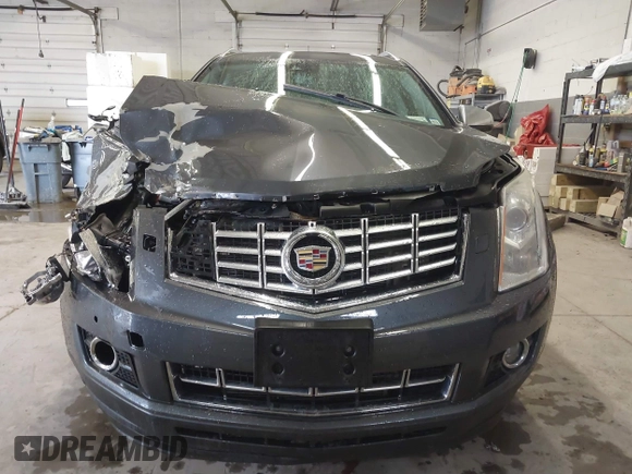 2013 Cadillac SRX Performance Collection with VIN 3GYFNHE37DS530908, listed as a IAAI auction lot 41662796 with 80,254 mi miles. Bid and sale history available at carsss.com. Image 13.