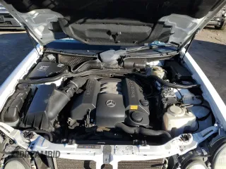 2000 Mercedes-Benz E-Class AWD with VIN WDBJF82G1YX028712, listed as a Copart auction lot 43983315 with 201,037 mi miles and Salvage Title. Bid and sale history available at carsss.com. Image 11.