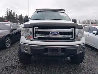 2014 Ford F-150 XL with VIN 1FTFW1EF1EKF65204, listed as a IAAI auction lot 41669195 with 84,882 mi miles. Bid and sale history available at carsss.com. Image 13.