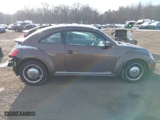2012 Volkswagen Beetle 2.5L PZEV with VIN 3VWJP7AT9CM609099, listed as a IAAI auction lot 41396554 with 151,393 mi miles. Bid and sale history available at carsss.com. Image 13.