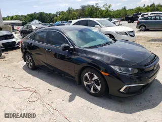 2019 Honda Civic Sedan LX with VIN 19XFC2F6XKE037186, listed as a Copart auction lot 53272305 with 128,186 mi miles and Non Repairable. Bid and sale history available at carsss.com. Image 4.