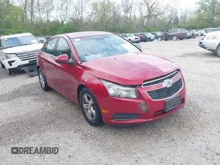 2014 Chevrolet Cruze 1LT with VIN 1G1PC5SB2E7357639, listed as a IAAI auction lot 42129404 with 154,174 mi miles and . Bid and sale history available at DreamBid. Image 1.