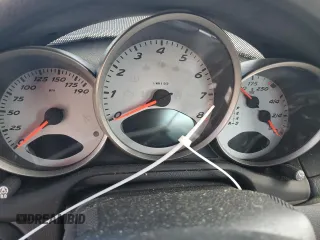 2005 Porsche Boxster S с VIN WP0CB29825U730665, выставлен на аукционе Copart как лот 74218244 с пробегом Не указан миль и На запчасти • Non repairable. История ставок и продаж доступна на DreamBid. Изображение 9.