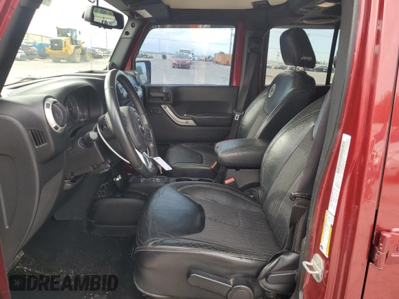 2013 Jeep Wrangler Unlimited Freedom z VIN 1C4BJWDG7DL582764, wystawiony jako Copart lot #54133275 z przebiegiem 183 507 mil mil oraz Szkoda całkowita • Salvage title. Historia ofert i sprzedaży dostępna na DreamBid. Obrazek 7.