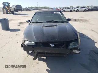 1999 Ford Mustang GT z VIN 1FAFP45X5XF224042, wystawiony jako Copart lot #52966565 z przebiegiem 145 862 mil mil oraz Szkoda całkowita • Salvage title. Historia ofert i sprzedaży dostępna na DreamBid. Obrazek 5.