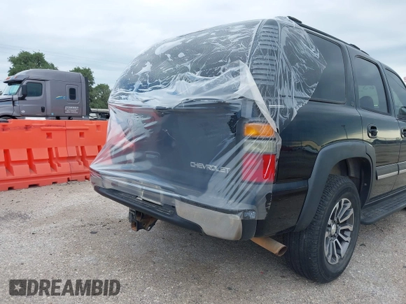 2004 Chevrolet Tahoe LS z VIN 1GNEC13Z04R248965, wystawiony jako IAAI lot #42031653 z przebiegiem 206 462 mil mil oraz . Historia ofert i sprzedaży dostępna na DreamBid. Obrazek 4.