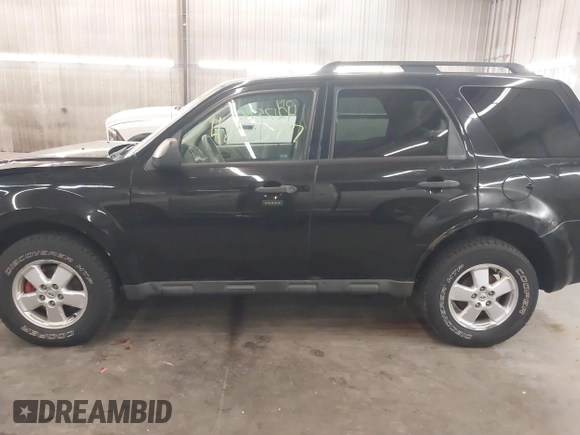 2011 Ford Escape XLT с VIN 1FMCU9DG9BKB14059, выставлен на аукционе IAAI как лот 42175947 с пробегом 113 901 миль миль и . История ставок и продаж доступна на DreamBid. Изображение 15.