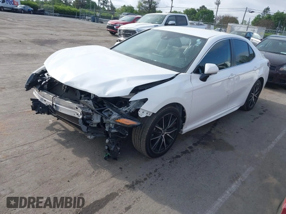2022 Toyota Camry SE with VIN 4T1G11AK6NU066677, listed as a IAAI auction lot 41892982 with 71,059 mi miles and . Bid and sale history available at carsss.com. Image 2.