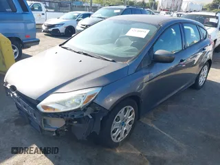 2012 Ford Focus SE z VIN 1FAHP3K23CL366865, wystawiony jako IAAI lot #42140894 z przebiegiem 168 754 mil mil oraz . Historia ofert i sprzedaży dostępna na DreamBid. Obrazek 2.