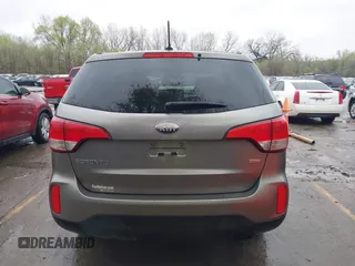2014 Kia Sorento LX with VIN 5XYKT3A67EG477367, listed as a IAAI auction lot 41911249 with 172,320 mi miles and . Bid and sale history available at DreamBid. Image 17.