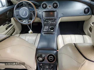 2013 Jaguar XJ with VIN SAJWA2GB8DLV52975, listed as a Copart auction lot 79123644 with 160,473 mi miles and Salvage Title. Bid and sale history available at carsss.com. Image 8.