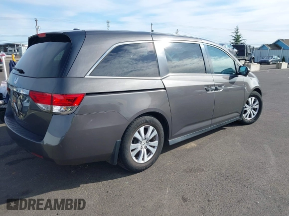 2016 Honda Odyssey EX-L with VIN 5FNRL5H62GB070194, listed as a IAAI auction lot 41664352 with 112,112 mi miles. Bid and sale history available at carsss.com. Image 4.