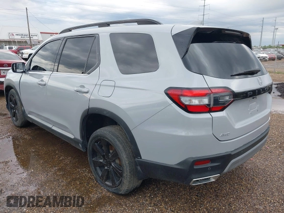 2024 Honda Pilot Touring z VIN 5FNYG1H71RB005034, wystawiony jako IAAI lot #42371878 z przebiegiem Nie podano mil oraz . Historia ofert i sprzedaży dostępna na DreamBid. Obrazek 3.