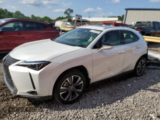 2023 Lexus UX 250h Premium z VIN JTHP6JBH2P2151828, wystawiony jako Copart lot #57197034 z przebiegiem 15 675 mil mil oraz Szkoda całkowita • Salvage title. Historia ofert i sprzedaży dostępna na DreamBid. Obrazek 1.