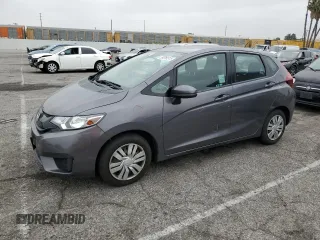 2015 Honda Fit LX z VIN 3HGGK5H58FM785137, wystawiony jako Copart lot #59013315 z przebiegiem 84 592 mil mil oraz Szkoda całkowita • Salvage title. Historia ofert i sprzedaży dostępna na DreamBid. Obrazek 1.