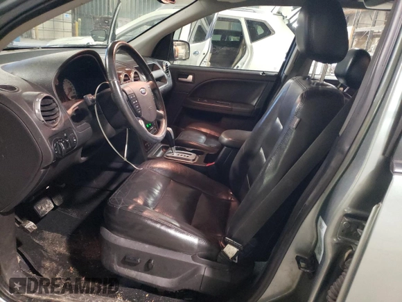 2005 Ford Freestyle Limited z VIN 1FMDK06125GA15962, wystawiony jako Copart lot #46181285 z przebiegiem 192 000 mil mil oraz Nie do naprawy • Non repairable. Historia ofert i sprzedaży dostępna na DreamBid. Obrazek 7.
