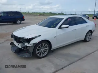 2019 Cadillac CTS Luxury RWD with VIN 1G6AR5SS7K0100804, listed as a IAAI auction lot 42067430 with 100,557 mi miles and . Bid and sale history available at DreamBid. Image 2.
