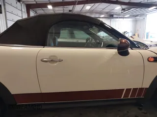 2013 MINI Roadster with VIN WMWSY1C52DT625564, listed as a IAAI auction lot 41442864 with 98,240 mi miles and . Bid and sale history available at DreamBid. Image 14.