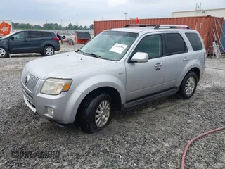2009 Mercury Mariner Premier z VIN 4M2CU87G59KJ25154, wystawiony jako IAAI lot #42050544 z przebiegiem 210 905 mil mil oraz . Historia ofert i sprzedaży dostępna na DreamBid. Obrazek 2.