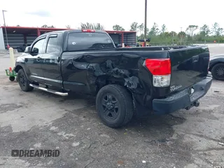 2011 Toyota Tundra 2WD Truck SR with VIN 5TFTY5F14BX007238, listed as a IAAI auction lot 41663289 with 126,499 mi miles. Bid and sale history available at carsss.com. Image 3.