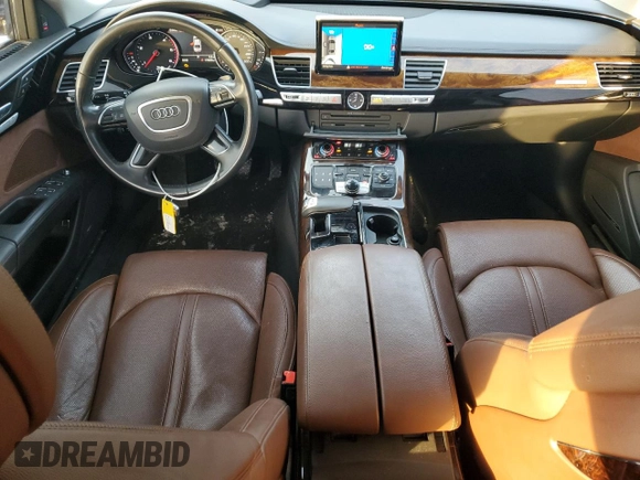 2016 Audi A8 with VIN WAUJRAFD5GN007742, listed as a Copart auction lot 44698375 with 110,830 mi miles and Salvage title. Bid and sale history available at DreamBid. Image 8.