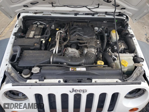 2013 Jeep Wrangler Unlimited Sport z VIN 1C4BJWDG0DL574795, wystawiony jako Copart lot #59230515 z przebiegiem 132 808 mil mil oraz Szkoda całkowita • Salvage title. Historia ofert i sprzedaży dostępna na DreamBid. Obrazek 12.
