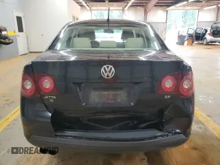 2010 Volkswagen Jetta Limited Edition with VIN 3VWAX7AJ4AM162032, listed as a Copart auction lot 56274115 with 164,642 mi miles and Salvage title. Bid and sale history available at DreamBid. Image 6.