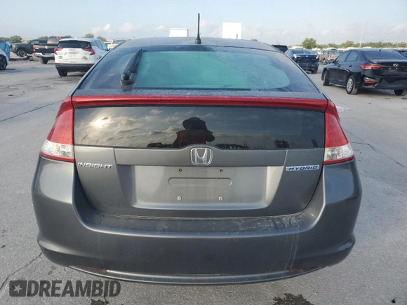 2010 Honda Insight EX with VIN JHMZE2H72AS025427, listed as a Copart auction lot 54983775 with 184,052 mi miles and Salvage Title. Bid and sale history available at DreamBid. Image 6.
