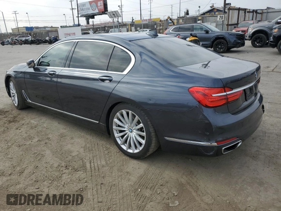 2016 BMW 7 Series 740i with VIN WBA7E2C51GG546677, listed as a Copart auction lot 63455445 with 106,553 mi miles and Salvage title. Bid and sale history available at DreamBid. Image 2.