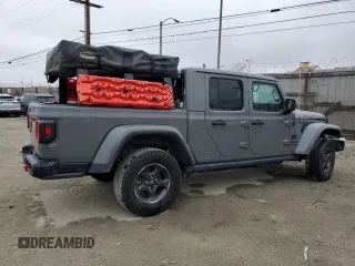 2021 Jeep Gladiator Rubicon with VIN 1C6JJTBG5ML615653, listed as a Copart auction lot 51297795 with 48,918 mi miles and Salvage title. Bid and sale history available at DreamBid. Image 3.