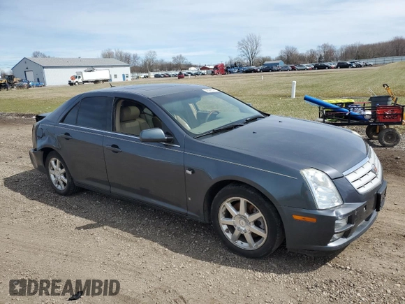 2007 Cadillac STS z VIN 1G6DW677970160672, wystawiony jako Copart lot #50568525 z przebiegiem 127 699 mil mil oraz Szkody całkowita. Historia ofert i sprzedaży dostępna na DreamBid. Obrazek 4.