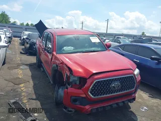 2019 Toyota Tacoma SR with VIN 3TMCZ5AN8KM198613, listed as a IAAI auction lot 42109369 with 183,747 mi miles and . Bid and sale history available at DreamBid. Image 1.
