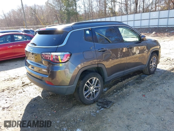 2020 Jeep Compass Latitude with VIN 3C4NJCBB4LT177001, listed as a IAAI auction lot 41210982 with 77,764 mi miles and . Bid and sale history available at DreamBid. Image 4.