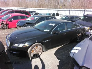 2016 Jaguar XJ Portfolio with VIN SAJWJ2GD8G8V92997, listed as a Copart auction lot 72420774 with 74,934 mi miles and Salvage Title. Bid and sale history available at DreamBid. Image 1.