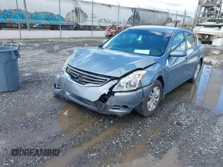 2012 Nissan Altima 2.5 S with VIN 1N4AL2AP8CC176936, listed as a IAAI auction lot 42012415 with 208,095 mi miles. Bid and sale history available at carsss.com. Image 2.