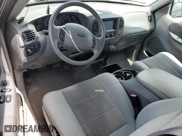 2004 Ford F-150 XL with VIN 2FTRX17274CA98376, listed as a Copart auction lot 56300585 with 71,767 mi miles and Salvage title. Bid and sale history available at DreamBid. Image 8.